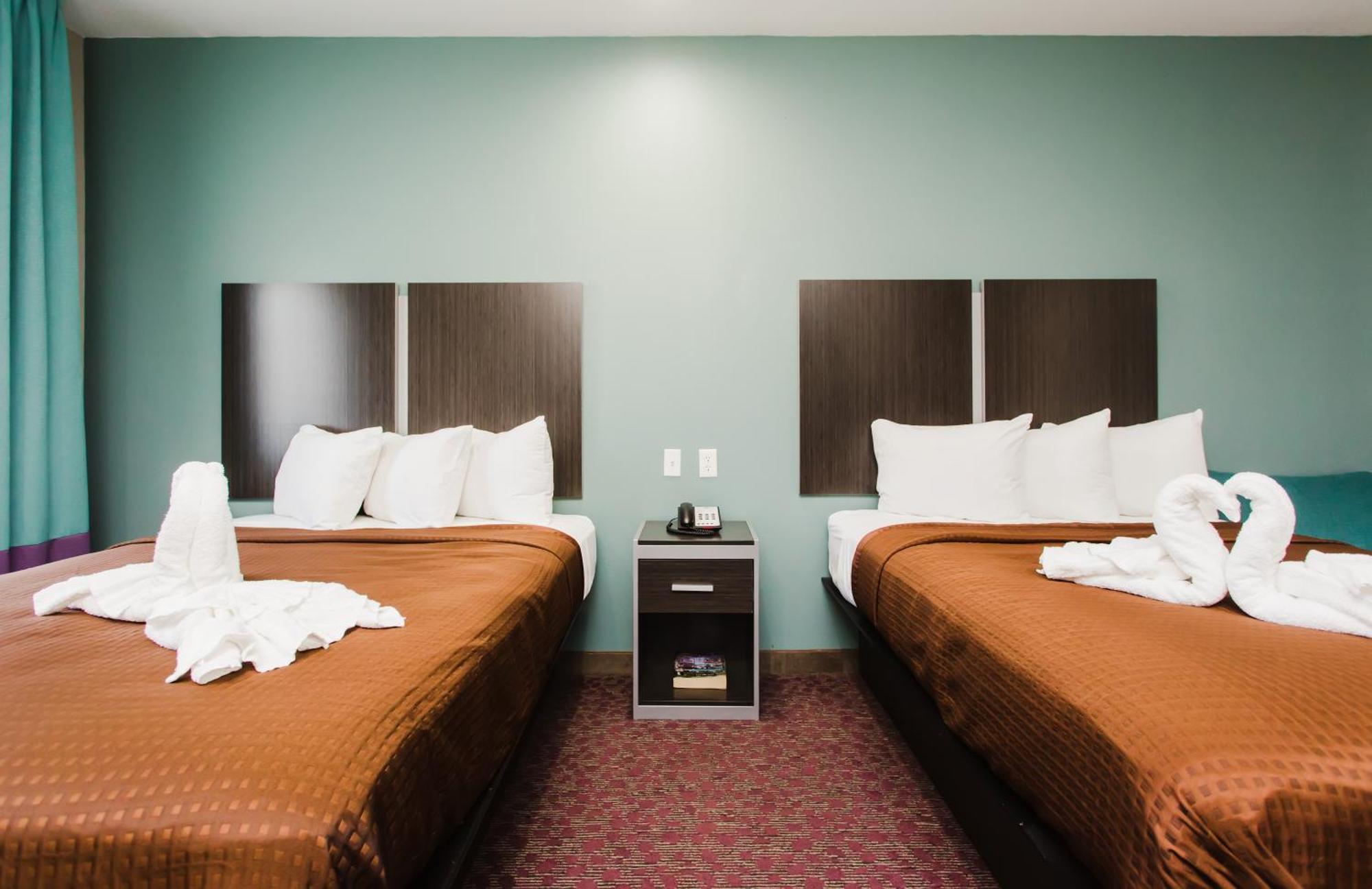 Express Inn - Spring Bagian luar foto
