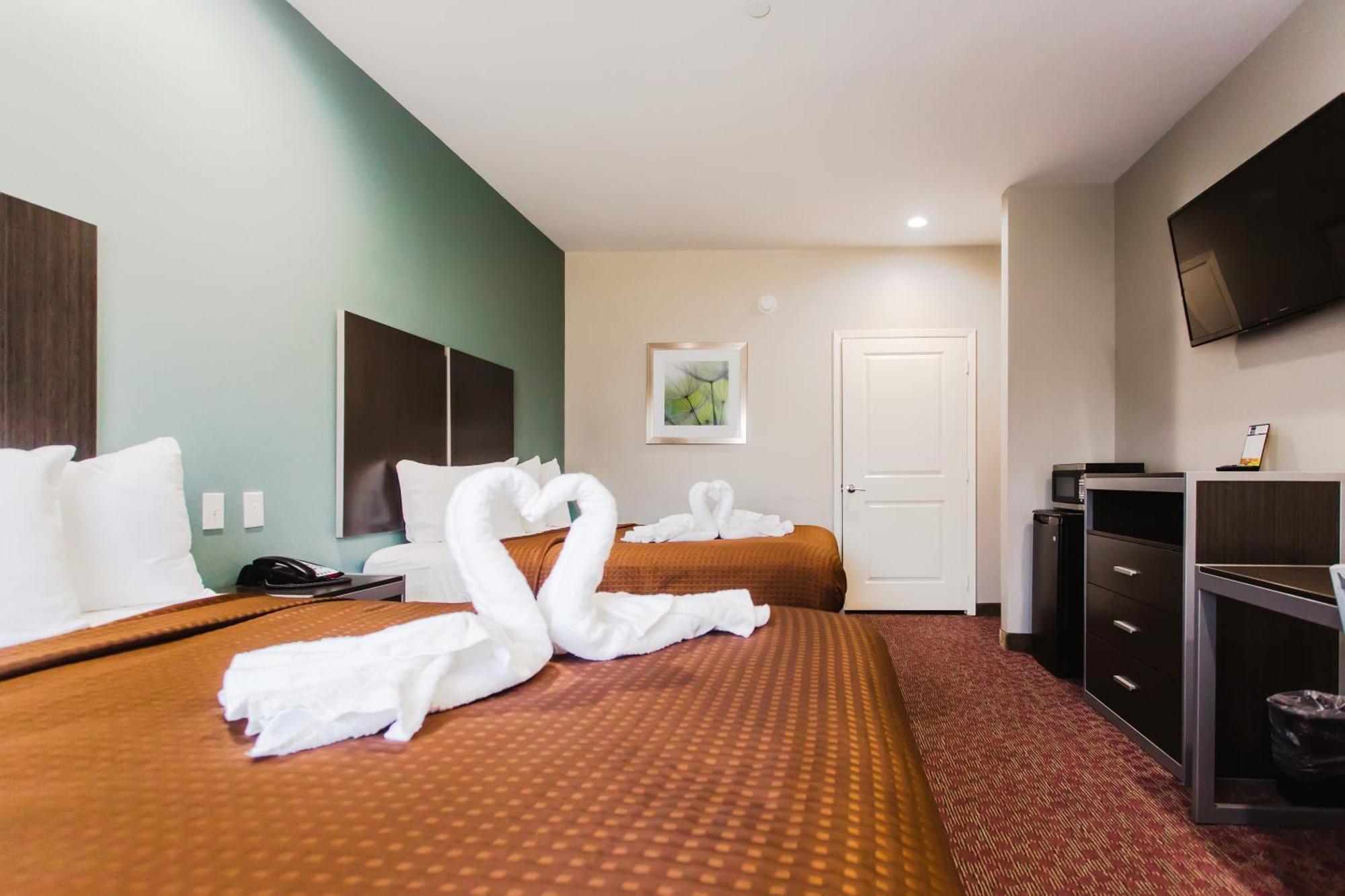 Express Inn - Spring Bagian luar foto