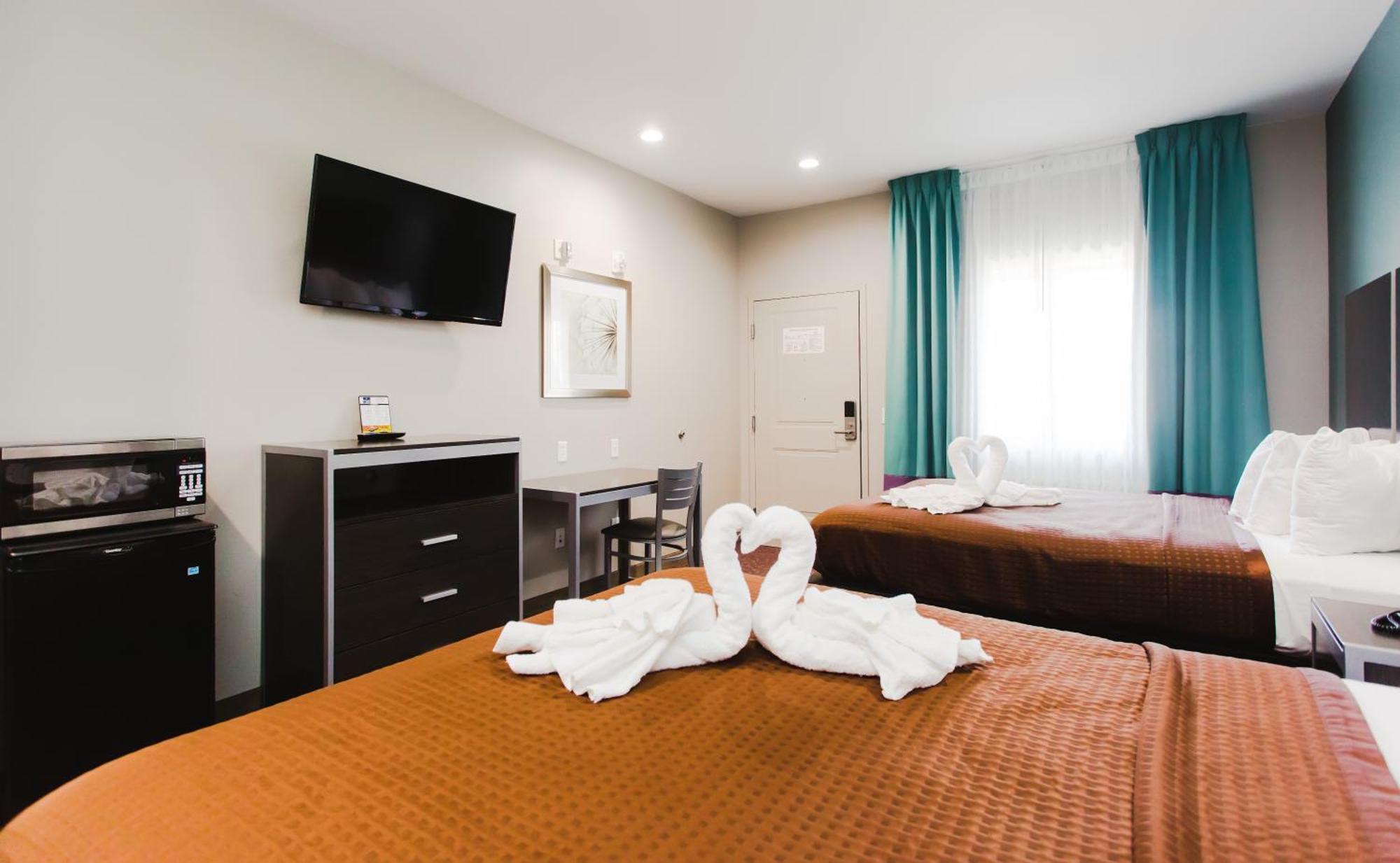 Express Inn - Spring Bagian luar foto