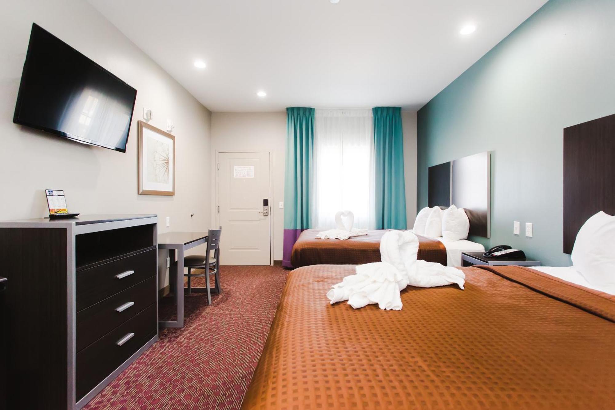 Express Inn - Spring Bagian luar foto