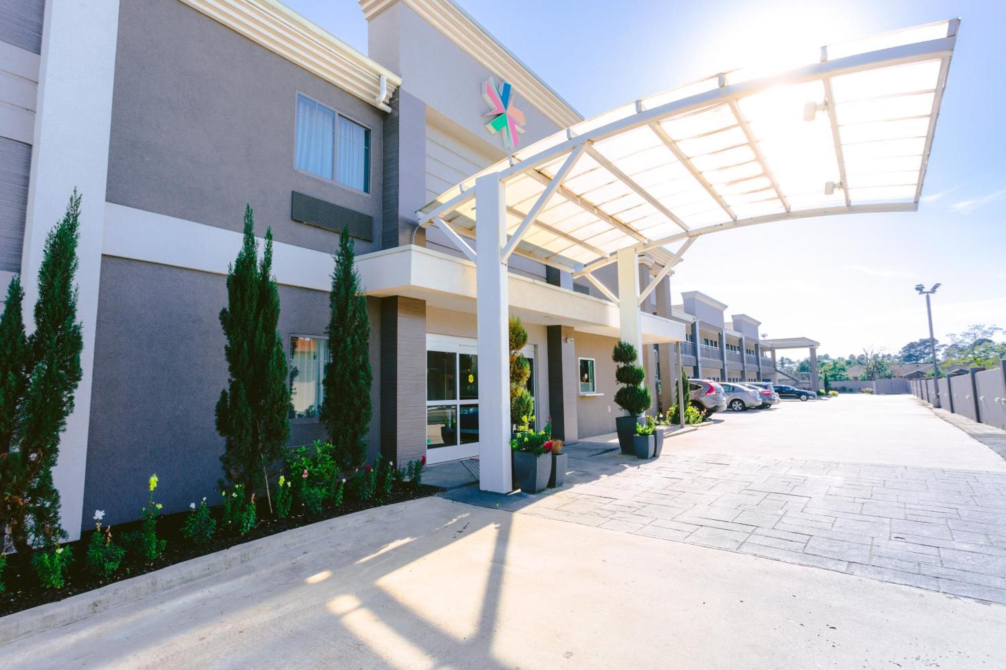 Express Inn - Spring Bagian luar foto