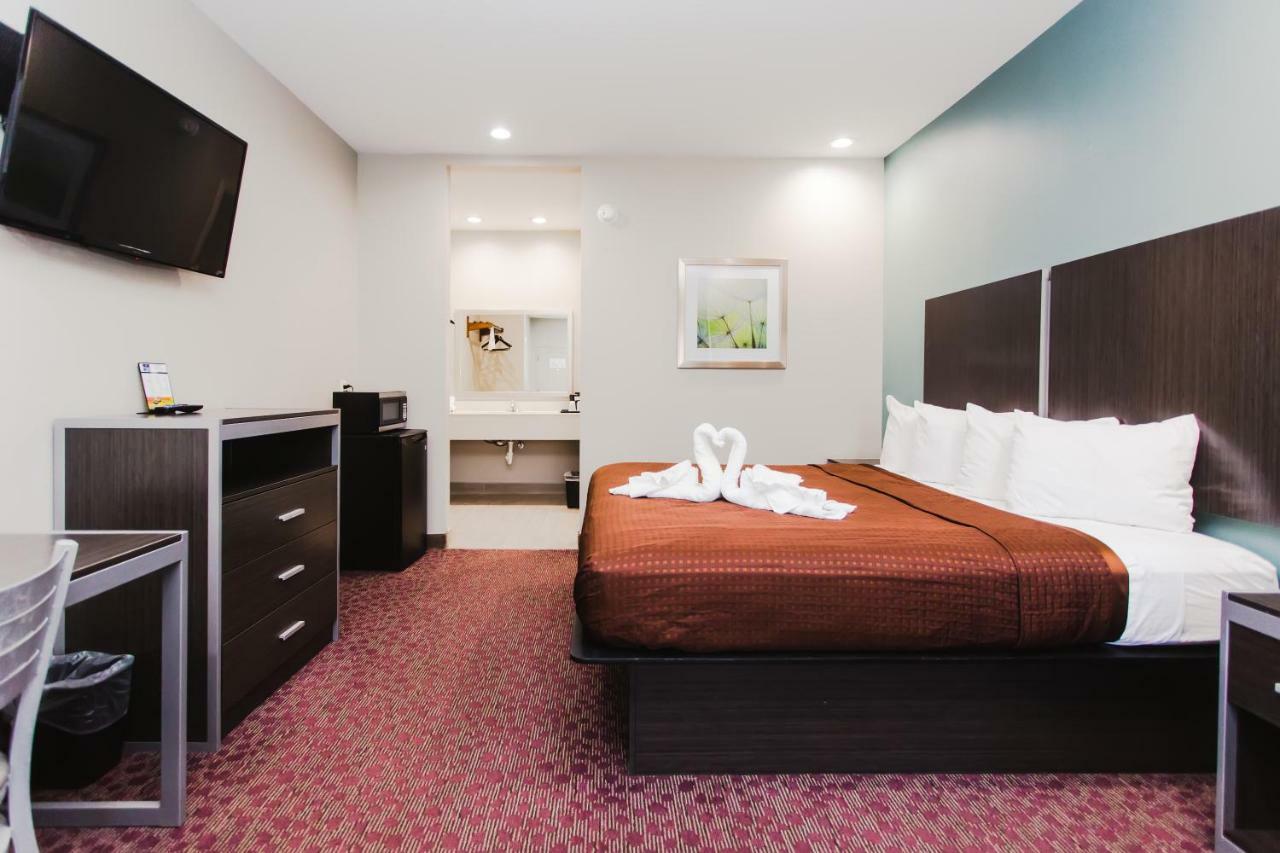 Express Inn - Spring Bagian luar foto