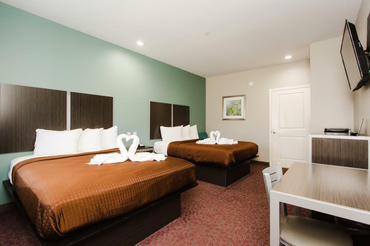 Express Inn - Spring Bagian luar foto